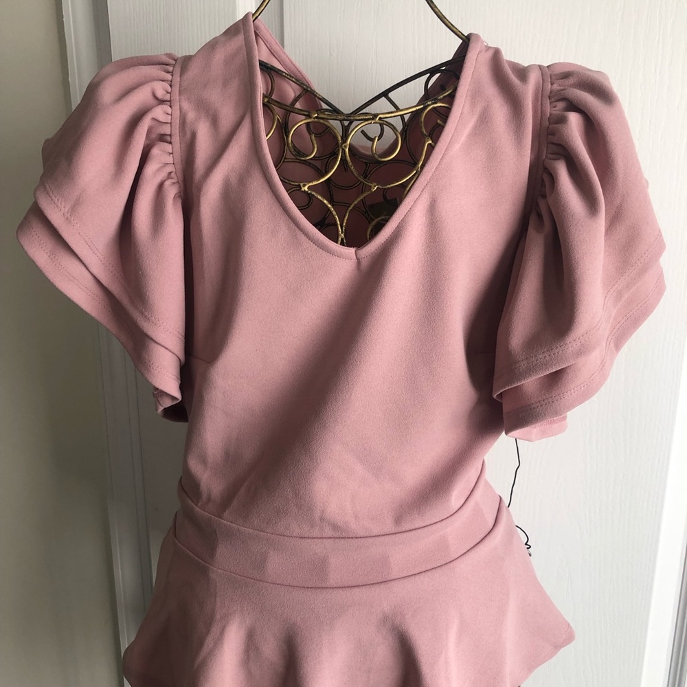 Peplum shirt with blouse sleeves